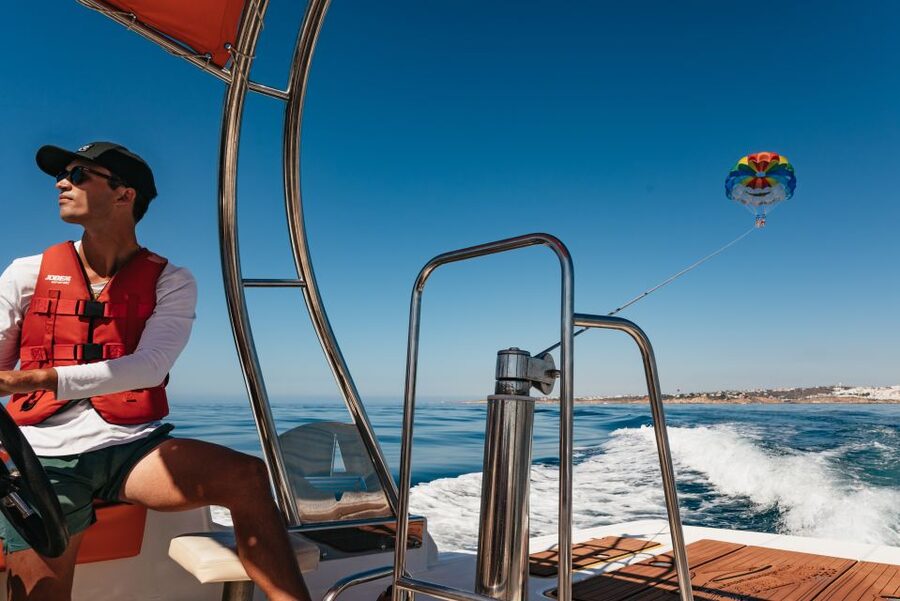 Albufeira: Parasailing Boat Trip - The Boat Ride Experience: Music, Laughs, and Waiting Your Turn