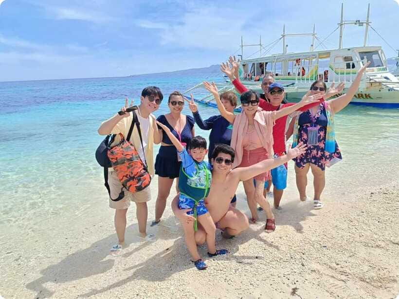 Boracay: Parasailing, Island Hopping, ATV Ride and Kawa Bath - Island hopping that actually includes swim time, not just boat rides