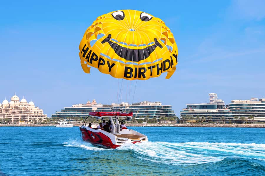 Dubai: Parasailing with Happy birthday Parachute JBR & Palm - Safety gear, boat tow, and the “okay, here we go” moment