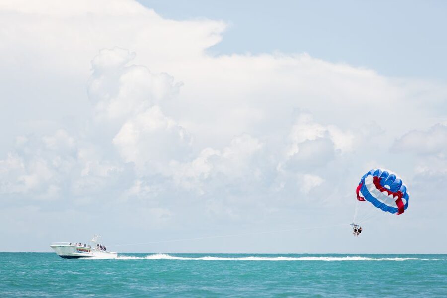 Key West Parasailing at Smathers Beach - The Lift-Off: Under a Red, White, and Blue Parasail