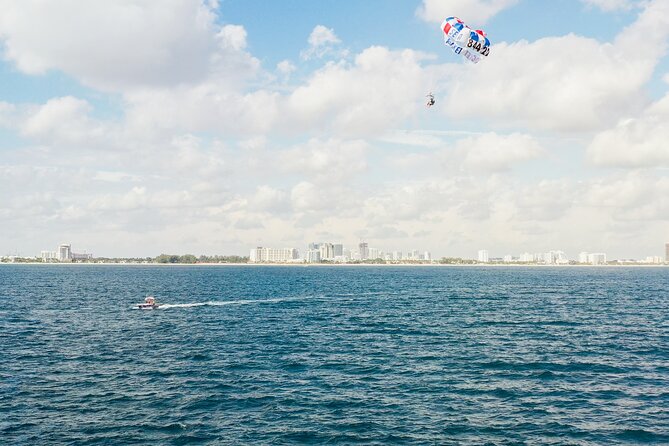 Ocean Parasailing Adventure In Fort Lauderdale, FL - Views you’re really paying for: skyline, ships, and mansions