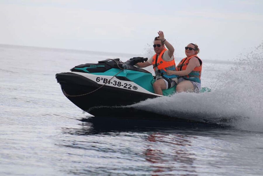 PACK TRIO Buggy, Jet Ski, and Parasailing Adventure - Parasailing over Lanzarote: the calm high moment after the speed