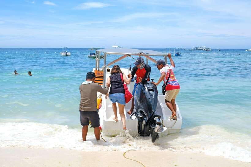 Panglao: Solo or Tandem Parasailing Experience near Alona - Where You Go: Alona Beach and the VIAJE/RFS Watersports Booth