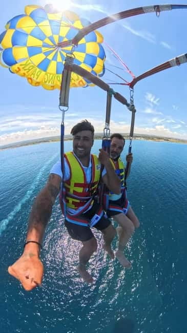Parasailing in Polignano: A parachute adventure - Paragliding is mentioned, but parasailing is the core