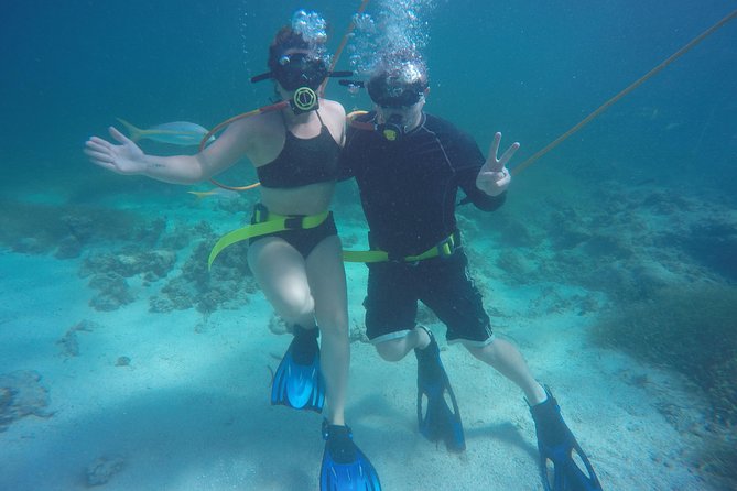Punta Cana Party Cruise with Snorkeling, Hooka Diving and Parasailing - The catamaran party section: open bar, music, and a first taste of the sea