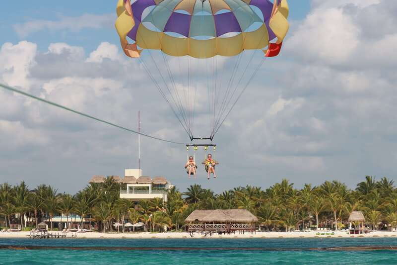 Riviera Maya: Parasailing Tour with Beach Club Access - Pickup, shared transport, and the return ride reality