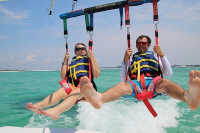 Sun Dogs Parasailing Tour in Destin Florida - Morning timing: when you’re most likely to see dolphins and ride smoother