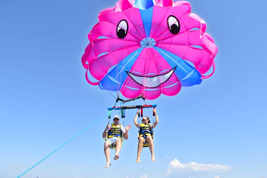Surfers Paradise: Parasailing and Jet Ski Tour Package - About guides and photo moments